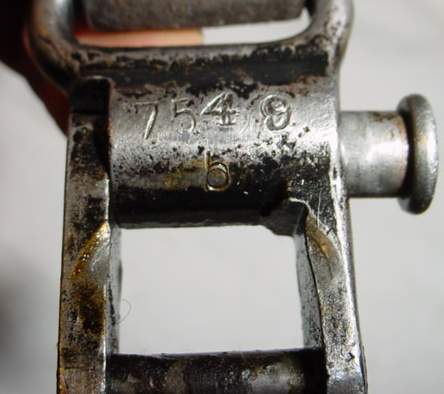 serial numbered MG34 buckle